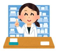 薬局のお薬の棚の前にいる薬剤師
